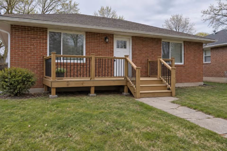 A new front-entry wood deck — proposed deck.